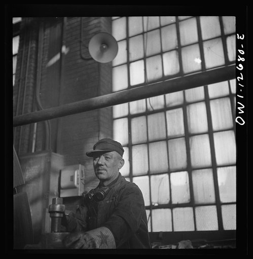 Chicago, Illinois. Operator of a refacing machine at the wheel shop in the Chicago and Northwestern Railroad repair shops