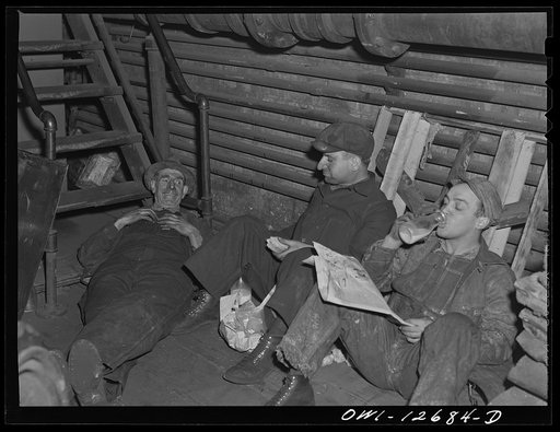 Chicago, Illinois. Workmen at a Chicago and Northwestern Railroad during their half-hour lunch period