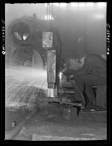 Chicago, Illinois. A welder who works in the roundhouse at the Chicago and Northwestern Railroad's Proviso yard