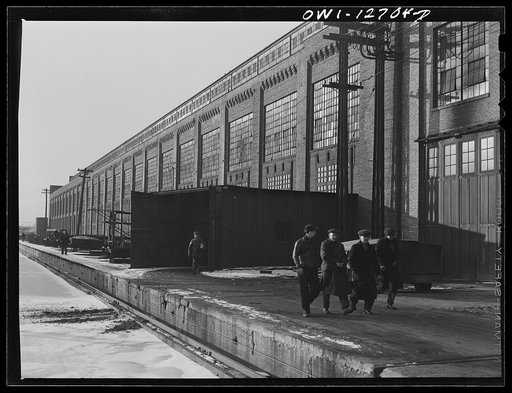Untitled photo, possibly related to: Chicago, Illinois. Workmen coming out of the Chicago and Northwestern Railroad locomotive shops at the end of the shift