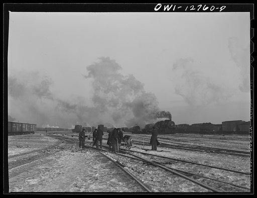 Untitled photo, possibly related to: Chicago, Illinois. Switchmen during a lull in the switching at one of the Chicago and Northwestern Railroad classification yards