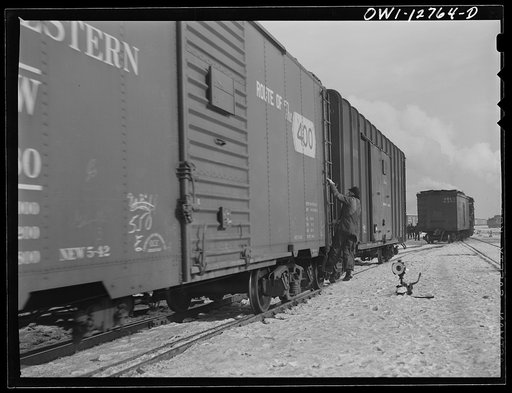 Chicago, Illinois. Switching cars in one of the Chicago and Northwestern Railroad classification yards