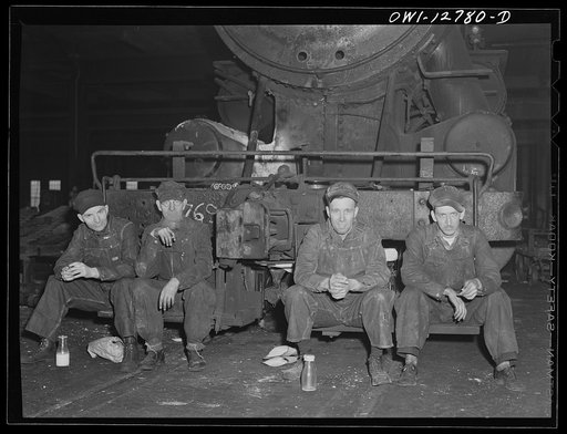 Chicago, Illinois. Workmen having lunch at the Chicago and Northwestern Railroad shops