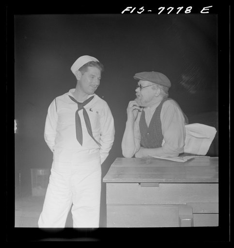 Untitled photo, possibly related to: New York, New York. Czechoslovakian Jew encountered at Astor Place about midnight. He has been in American since 1905, has been on relief eight years; spends all spare time collecting scrap for defense; picked up paper because he cannot afford to buy one. However