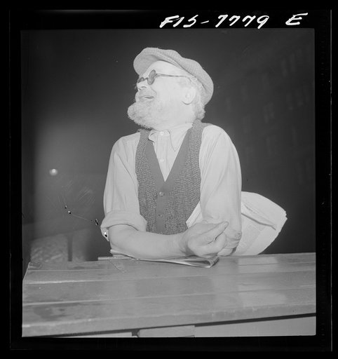 New York, New York. Czech Jew encountered at Astor Place about midnight. He has been in America since 1905, has been on relief eight years; spends all spare time collecting scrap for defense, picked up paper because he cannot afford to buy one. However, he keeps up with the times; was out for a stro