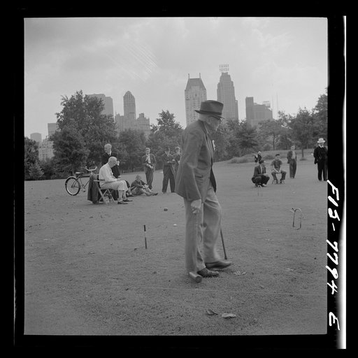 Untitled photo, possibly related to: New York, New York. Croquet game on Sunday in Central Park