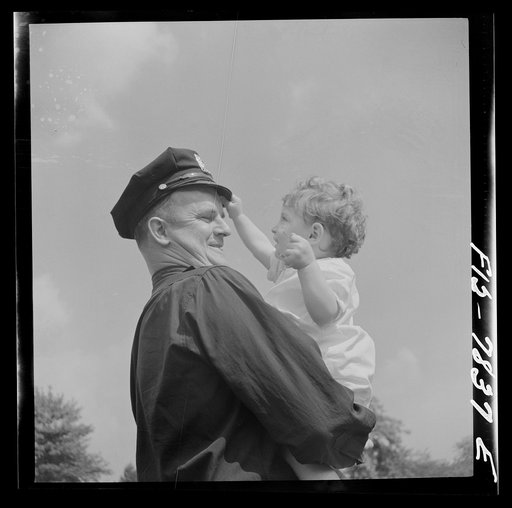 New York, New York. Irish-American policeman in Central Park on Sunday