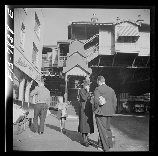 New York, New York. 94th Street. Station of the Third Avenue elevated railway at 8 a.m.