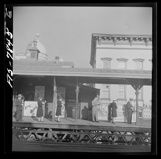 Untitled photo, possibly related to: New York, New York. The 76th Street station of the Third Avenue elevated railway at 8 a.m.