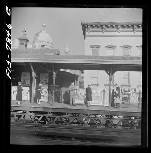 New York, New York. The 76th Street station of the Third Avenue elevated railway at 8 a.m.