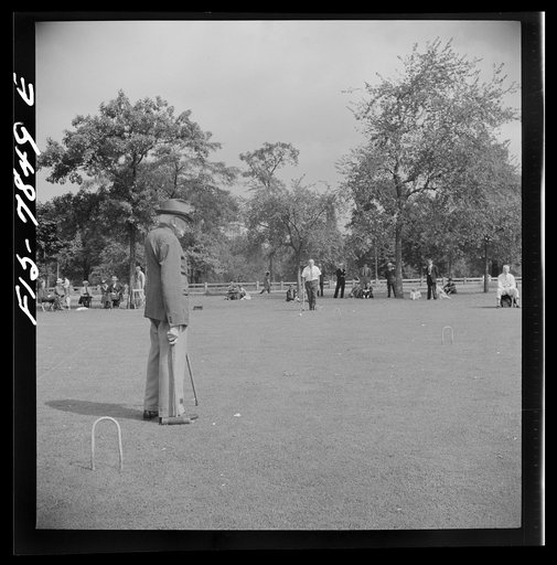 Untitled photo, possibly related to: New York, New York. Croquet game on Sunday in Central Park