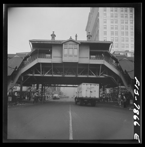 Untitled photo, possibly related to: New York, New York. Looking west at the Third Avenue elevated railway on 14th Street at 7 a.m