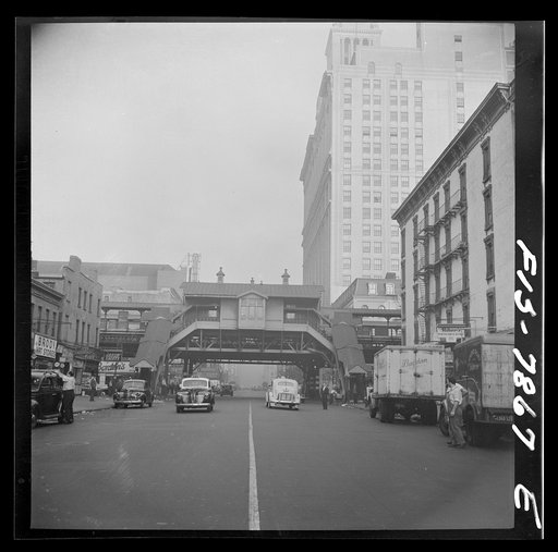 New York, New York. Looking west at the Third Avenue elevated railway on 14th Street at 7 a.m.