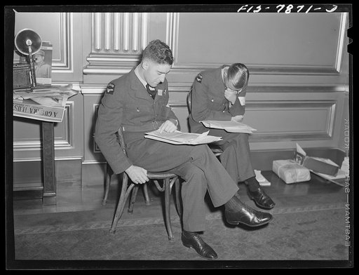 Washington, D.C. International youth assembly. New Zealand delegates reading press releases on assembly