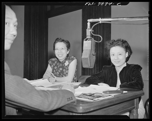 Untitled photo, possibly related to: Washington, D.C. International student assembly. Left to Right: Mr. Kenneth C. Sze, Mr. Gerald Tien, Miss Gwh-Fang Dyn, Miss Helen Cheng, broadcasting to China by shortwave