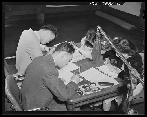 Washington, D.C. International student assembly. Left to right: Mr. Kenneth C. Sze, Mr. Gerald Tien, Miss Gwh-Fang Dyn, Miss Helen Cheng, broadcasting to China by shortwave