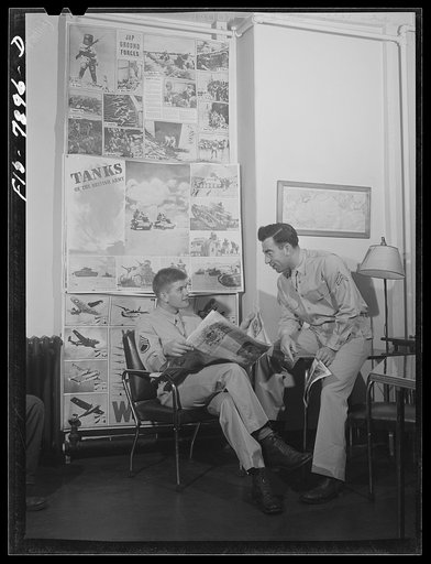 Untitled photo, possibly related to: Fort Belvoir, Virginia. Sergeant George Camblair waiting for mess call in the recreation room at camp