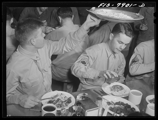Fort Belvoir, Virginia. Sergeant George Camblair in the mess hall for lunch