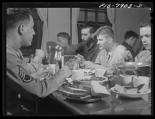 Fort Belvoir, Virginia. Sergeant George Camblair in the mess hall for lunch