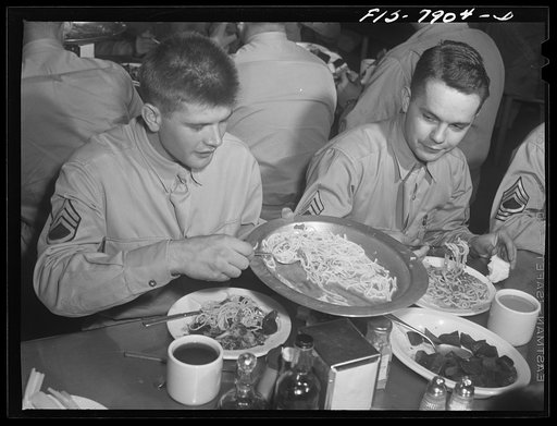 Fort Belvoir, Virginia. Sergeant George Camblair in the mess hall for lunch