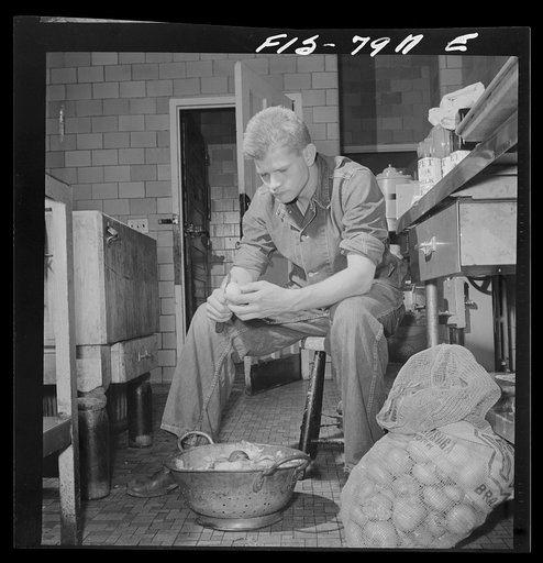 Fort Belvoir, Virginia. Sergeant George Camblair on kitchen police duty
