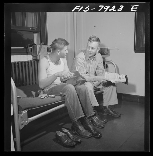 Fort Belvoir, Virginia. A regular part of Sergeant George Camblair's chores is shoe shining