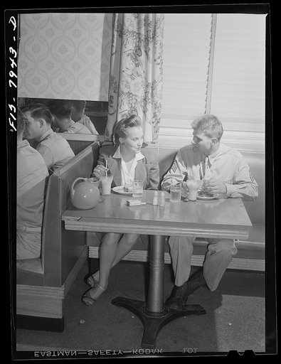 Untitled photo, possibly related to: Washington, D.C. Sergeant George Camblair taking his girl for refreshments after a dance at the United Service Organization (USO)