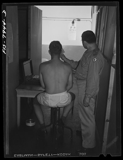 Baltimore, Maryland. George Camblair's eyes being examined at the induction station