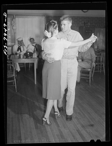 Washington, D.C. Sergeant George Camblair taking his girlfriend dancing at the United Service Organization (USO) during a weekend furlough