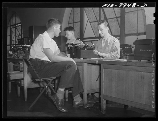 Untitled photo, possibly related to: Baltimore, Maryland. George Camblair being interviewed at the induction station