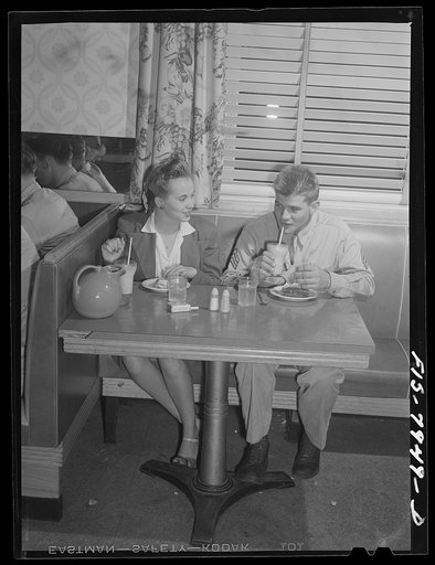 Washington, D.C. Sergeant George Camblair taking his girl for refreshments after a dance at the United Service Organization (USO)