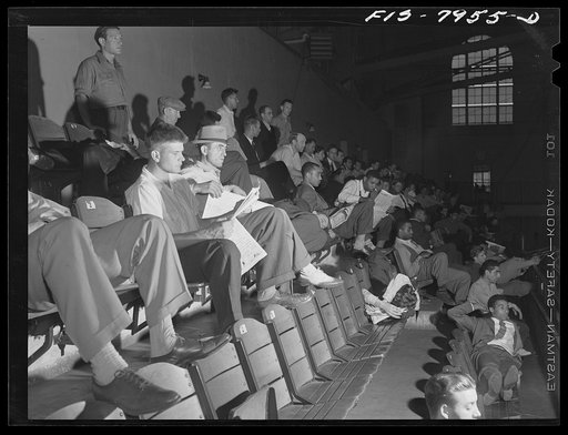 Baltimore, Maryland. George Camblair waiting his turn for physical examination at the induction station with many other young men