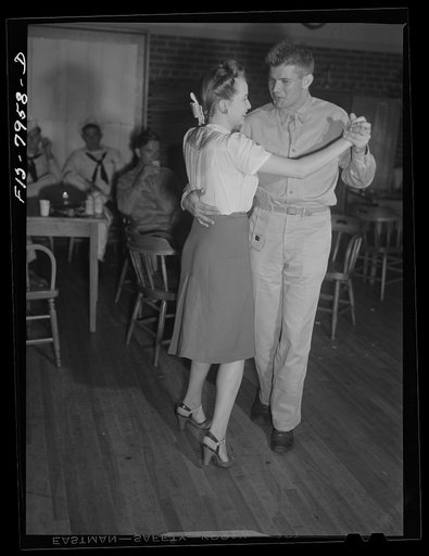 Washington, D.C. Sergeant George Camblair taking his girlfriend dancing at the United Service Organization (USO) during a weekend furlough