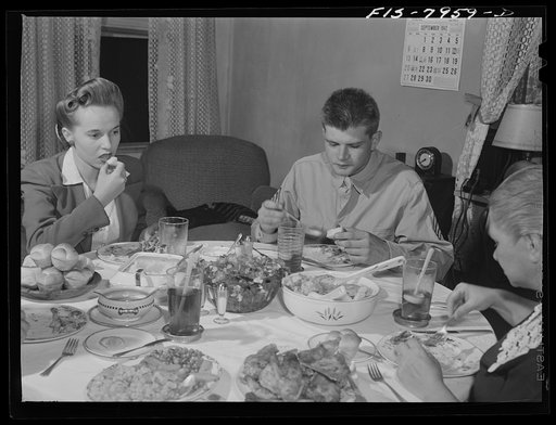 Untitled photo, possibly related to: Washington, D.C. Sergeant George Camblair and his girlfriend having dinner with his family while he is at home on a weekend furlough