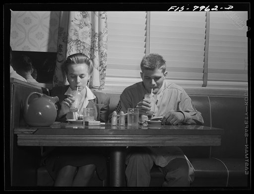Untitled photo, possibly related to: Washington, D.C. Sergeant George Camblair taking his girl for refreshments after a dance at the United Service Organization (USO)