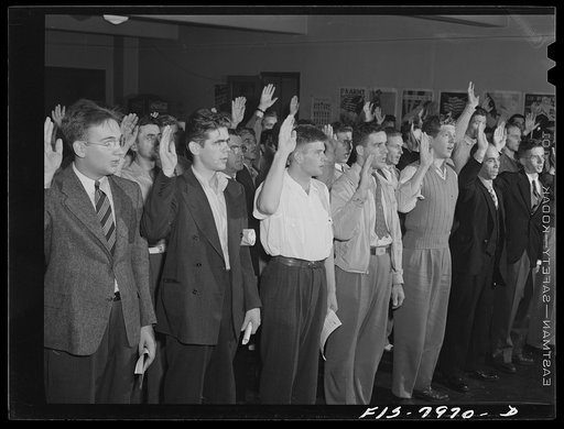 Baltimore, Maryland. George Camblair, having been found physically fit, takes the oath at the induction center