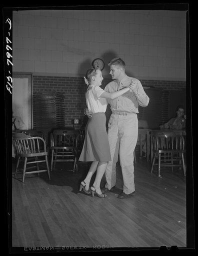 Washington, D.C. Sergeant George Camblair taking his girl dancing at the United Service Organization (USO) while he is at home on a weekend furlough
