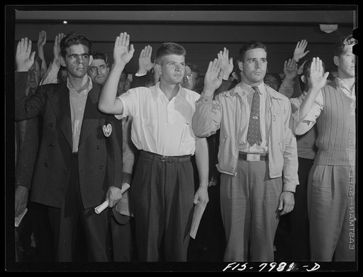 Baltimore, Maryland. George Camblair, having been found physically fit, takes the oath at the induction center