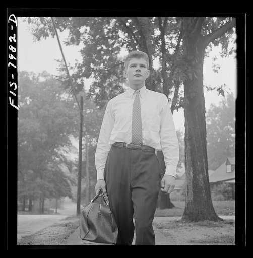 Washington, D.C. George Camblair leaving home early in the morning to go to the Selective Service Board from which, with about fifty others, he will leave by train for the induction station