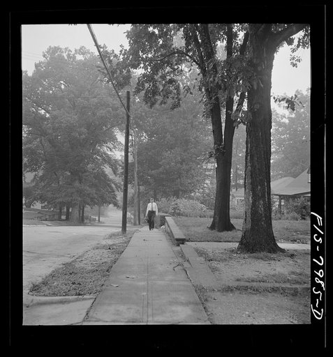 Washington, D.C. George Camblair leaving home early in the morning to go to the Selective Service Board from which, with about fifty others, he will leave by train for the induction station