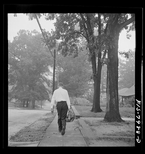Washington, D.C. George Camblair leaving home early in the morning to go to the Selective Service Board from which, with about fifty others, he will leave by train for the induction station
