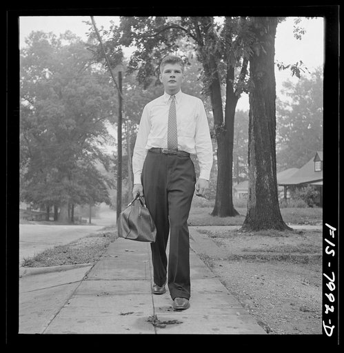 Untitled photo, possibly related to: Washington, D.C. George Camblair leaving home early in the morning to go to the Selective Service Board from which, with about fifty others, he will leave by train for the induction station