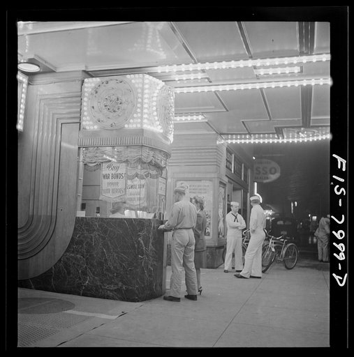 Washington, D.C. Sergeant George Camblair taking his girlfriend to the movies while he is at home on a weekend furlough
