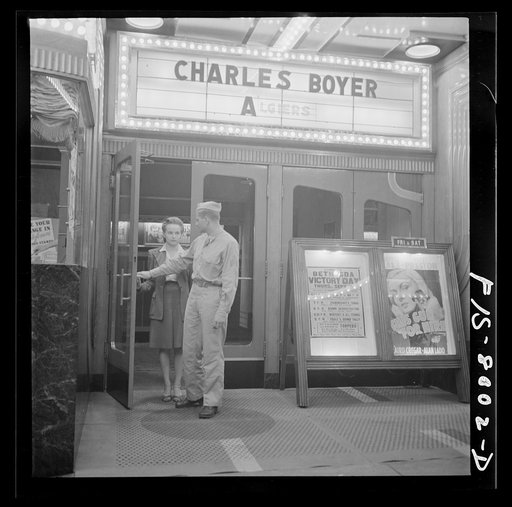 Untitled photo, possibly related to: Washington, D.C. Sergeant George Camblair taking his girlfriend to the movies while he is at home on a weekend furlough