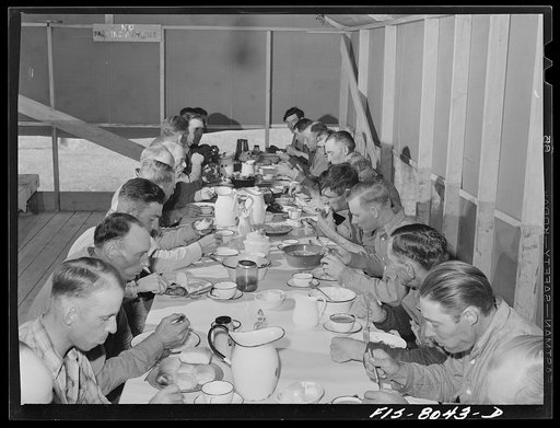 Big Hole Valley, Beaverhead County, Montana. Haying hands eating dinner at the C-D ranch
