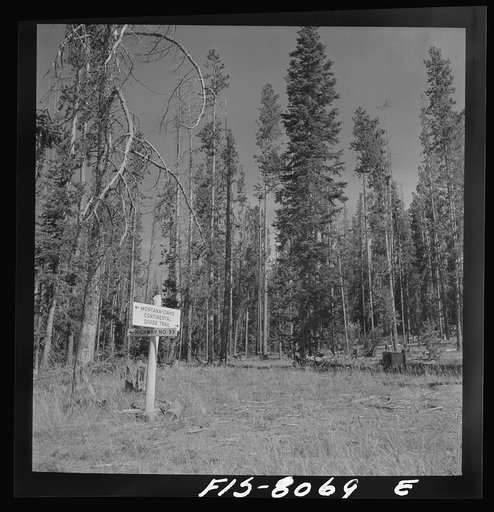 Untitled photo, possibly related to: Sign on the continental divide, which is also the boundary between Idaho and Montana