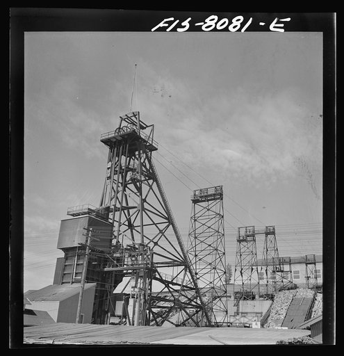 Butte, Montana. Anaconda Copper Mining Company. Headframe and hoist towers of the mountain con mine