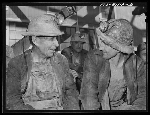 Butte, Montana. Anaconda Copper Mining Company. Miners on the surface waiting to go down in the cage