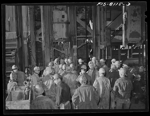Butte, Montana. Anaconda Copper Mining Company. Group of miners on the surface getting ready to go down in the cage