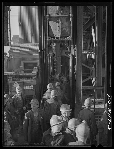 Butte, Montana. Anaconda Copper Mining Company. Group of miners on the surface getting ready to go down in the cage